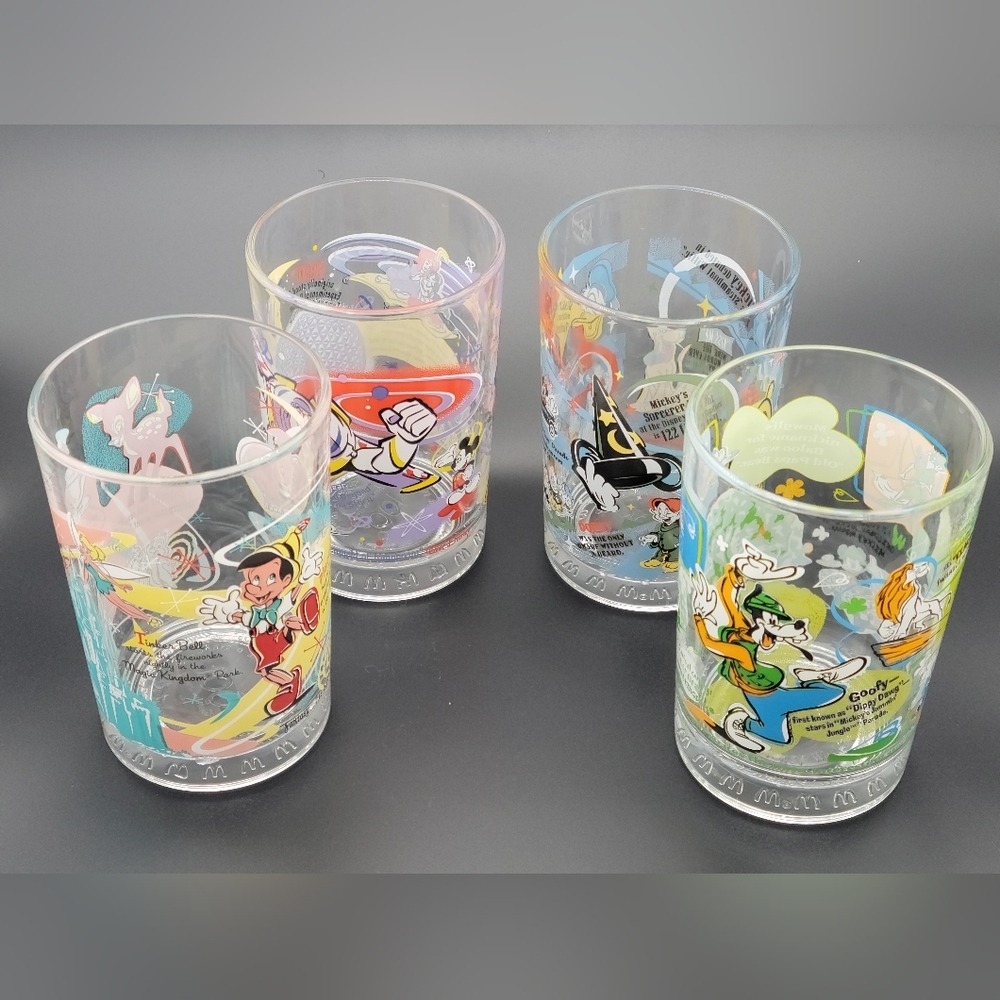 4 Vintage Nostalgic McDonald's & Disney's 100 Years of Magic celebration glasses
